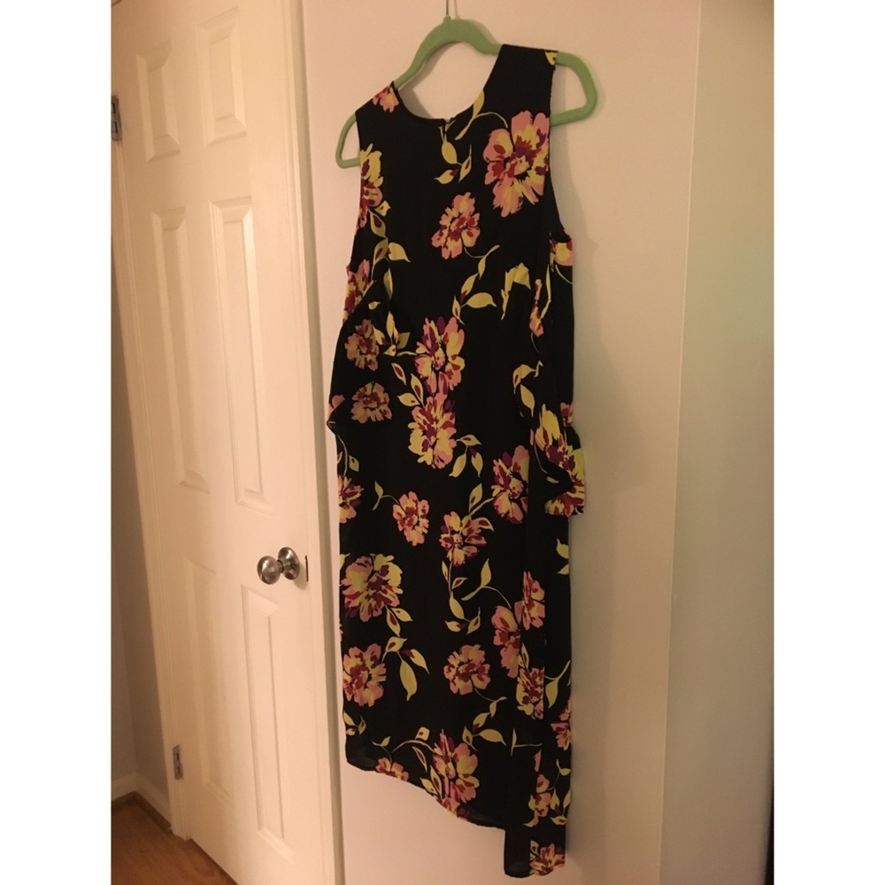 Midi dress with flattering half peplum